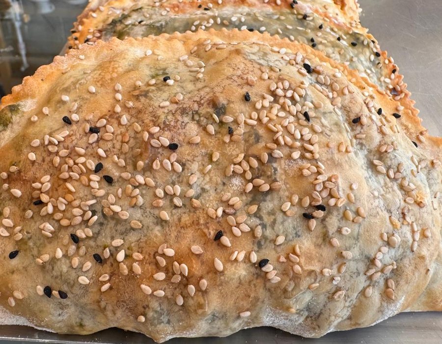 Large family-size cheese and spinach pie, traditional Cretan pastry