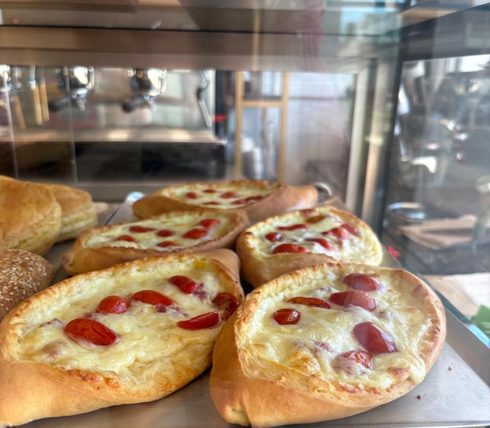 Boat-shaped bread filled with cheese, traditional Greek pastry
